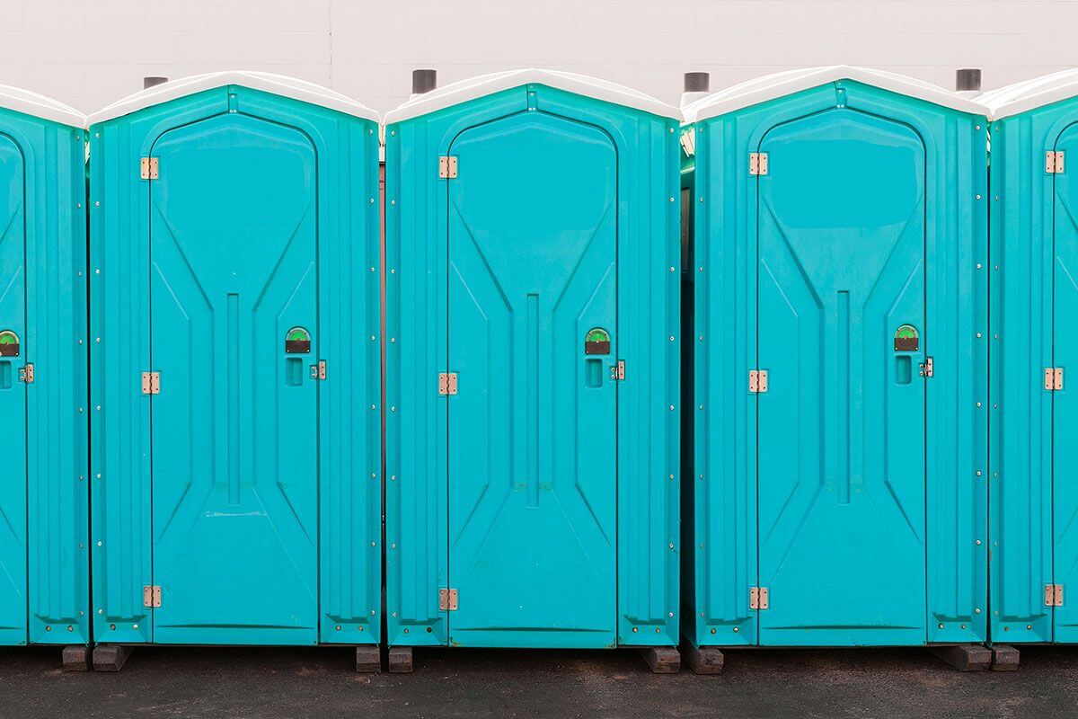 Industrial portable restroom units at a plant in Bismarck, North Dakota